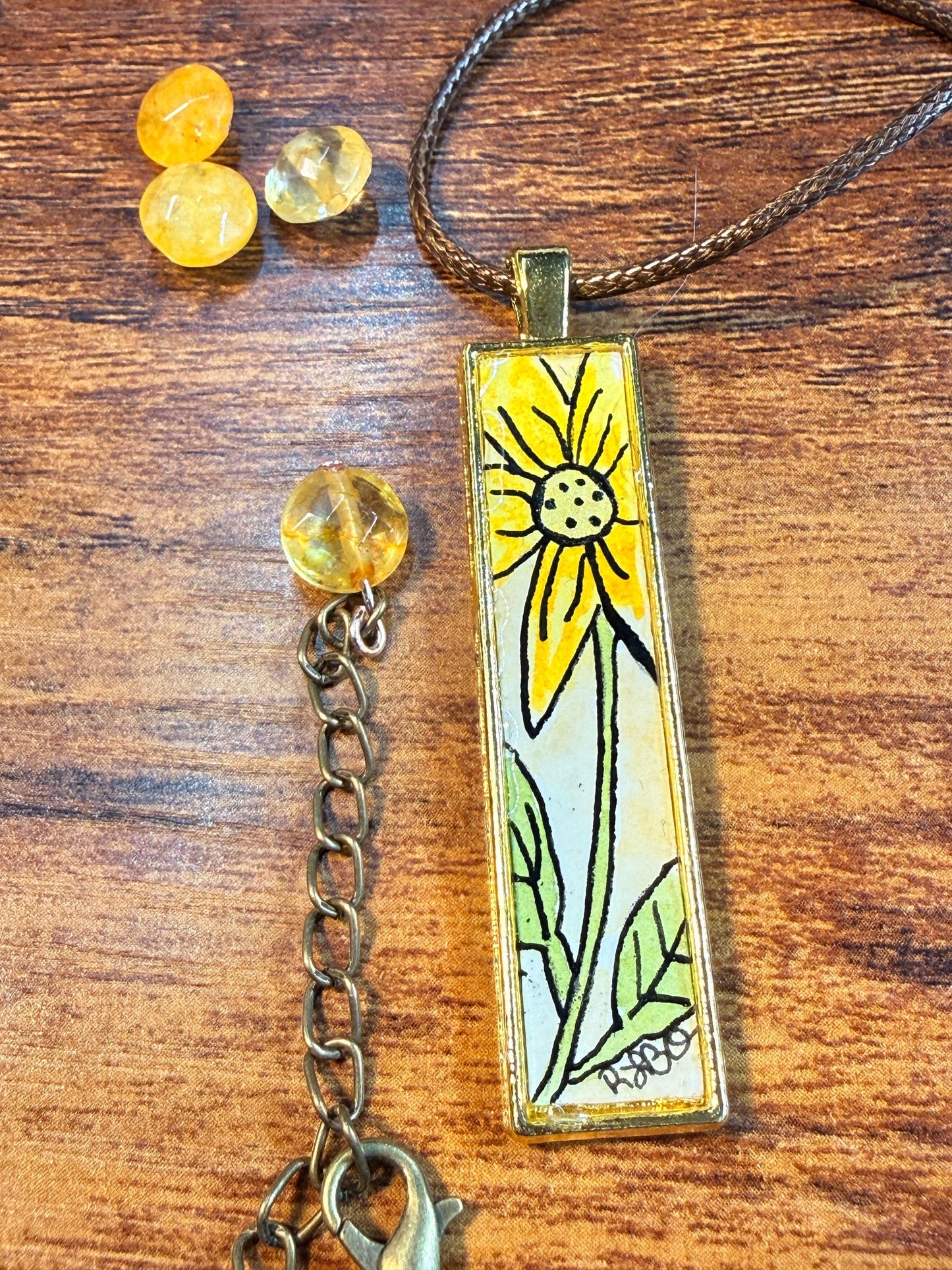 Gold sunflower pendant necklace with gem, botanical boho style jewelry, gift for her, hippy aesthetic, pale yellow gem