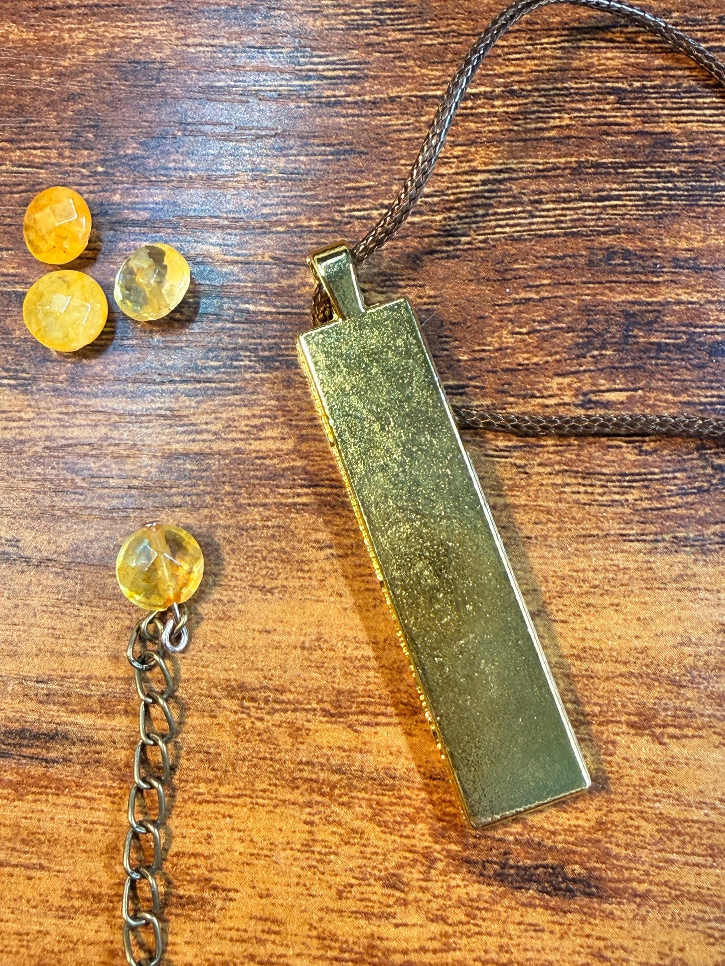 Gold sunflower pendant necklace with gem, botanical boho style jewelry, gift for her, hippy aesthetic, pale yellow gem